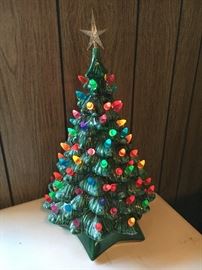 One of three vintage lighted ceramic Christmas trees.