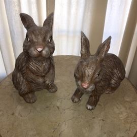 Two cute large ceramic bunnys.