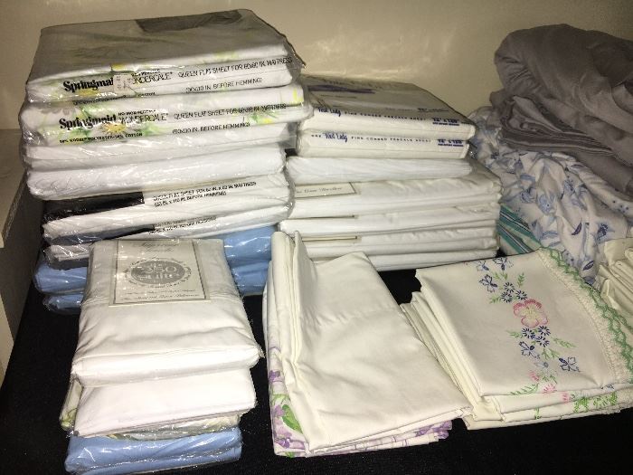 Household linens, some new in packages.