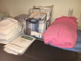 Household linens, some new in packages.