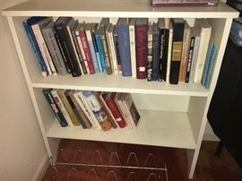 Small bookcase and books.