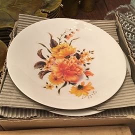 Vintage, unused and boxed—floral plates.
