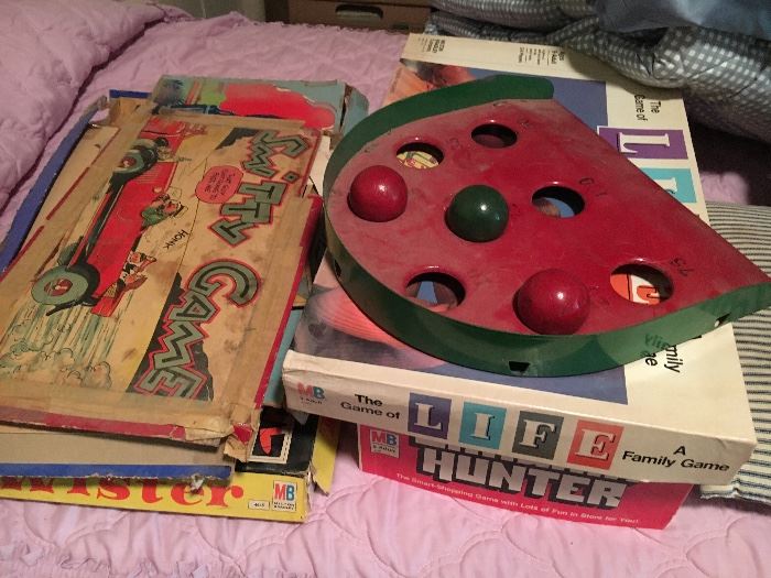 Vintage board games and metal skill ball game.