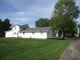 Back yard and view of back of home at 206 N. Jefferson