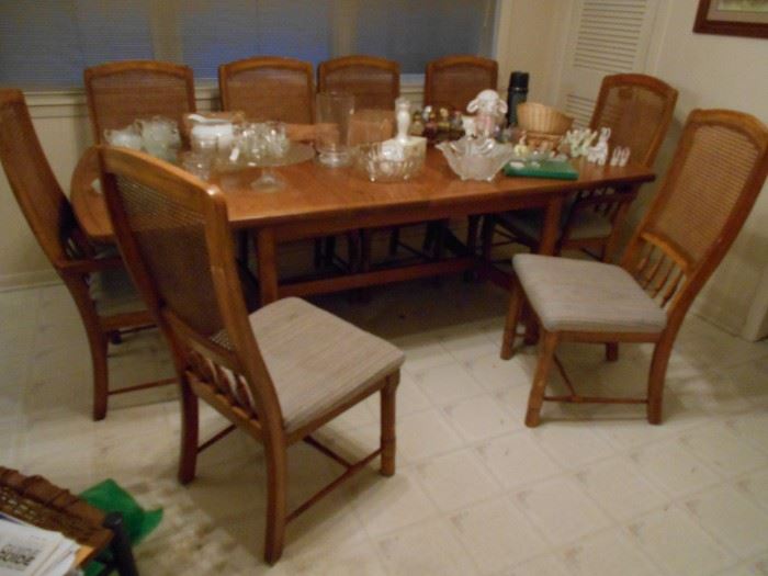 Dining room table and eight matching chairs