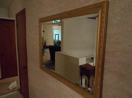 Large golden edged mirror