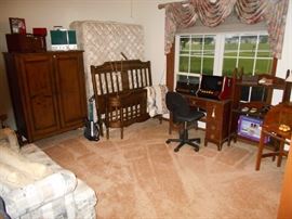 Wardrobe and desk with swivel office chair