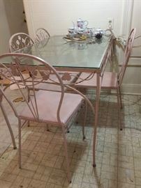 pink iron glass top table, 4 chairs