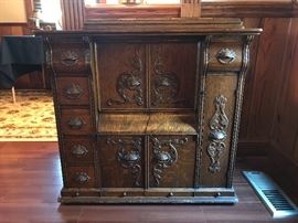 Singer “Red eye” Sewing machine with parlor cabinet 
