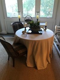 Draped round Table, Pair Plaid upholstered occasional chairs