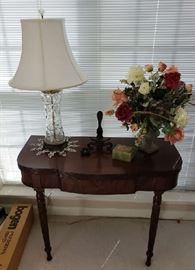 Game Table, Crystal Lamp and Beautiful Silk Arrangement.
