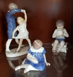 Bing & Grondahl Figurines Girl with Doll sitting on her side.