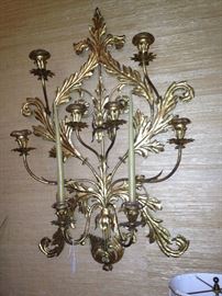 Stunning gold colored wall sconce