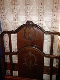 One of two very fine antique twin head boards and foot boards
