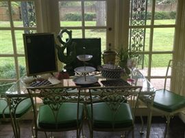 Vintage wrought iron glass top breakfast/patio table with 6 chairs
