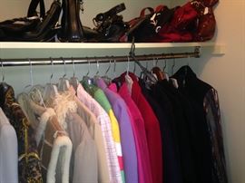 One of many closets filled with fine clothes