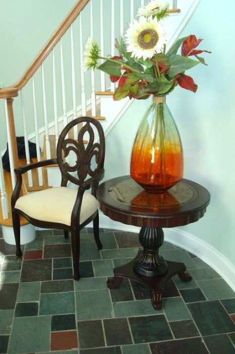 Marble top round pedestal table. Federal chair & vase of flowers.
