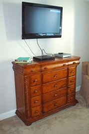 Dresser to king bedroom suite and Phillips HDTV with wall rack. 50 inch Panasonic HDTV not shown.