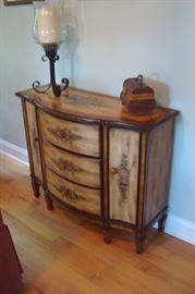 Hand decorated serving chest.
