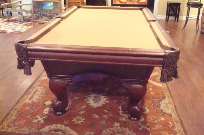 American Heritage pool table and rug.
