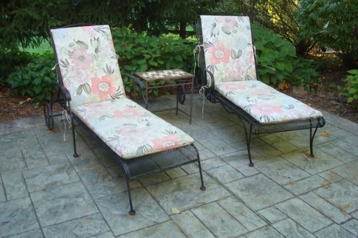 Pair patio lounge chairs.