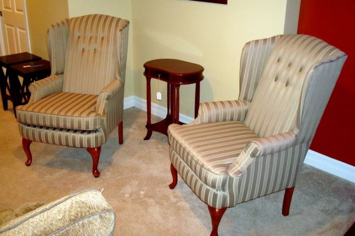 Pair custom upholstered wing back chairs.