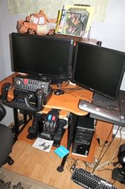 Computer desk, computer monitors, Saitek flight simulator controls