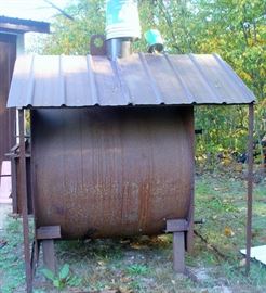 OUTSIDE WOOD HEATER.  YOU WILL NEED HELP TO LOAD THIS BEAUTY