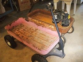 TWO OLD METAL WAGONS...RESTORE OR DISPLAY AS IS.  ONE IS RADIO FLYER.  COLLECTIBLE PIECES