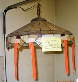 ANTIQUE HANGING STAINED GLASS LAMP WITH DIAMOND POINT EDGES. 