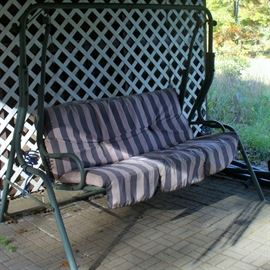 OUTDOOR SWING.  COVER IN POLE BARN
