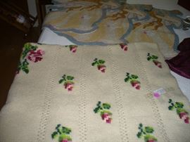 BEAUTIFUL COVERLET.  ANOTHER POSSIBLE CHRISTMAS GIFT.  APPEARS TO BE HAND MADE.  NOTICE THE 3 HOOKED ANGEL RUGS BEHIND THE COVERLET PERFECT FOR A LITTLE GIRLS ROOM OR AS WALL HANGINGS.