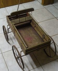 YOU WILL LOVE THIS LITTLE OL' WOODEN WAGON.  NICE ACCENT PIECE OR WOULD MAKE A GREAT KITTY BED