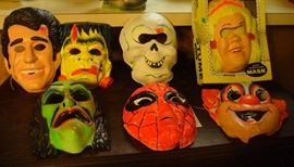 COLLECTION OF OLD HALLOWEEN MASKS JUST IN TIME FOR THE HOLIDAY.  ELVIS, CASPER, BOZO,SPIDERMAN, ETC AND A FULL COSTUME IN THE ORIGINAL BOX NEVER WORN