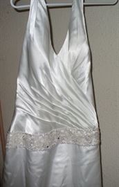 CLOSE UP OF DAVID'S BRIDAL GOWN SHOWING BEADING AND BEAUTIFUL TOP
