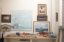 The lighthouse picture opens up to reveal a white board for office use!  