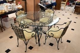 Wrought iron glass dining set.  Heavy and NICE.