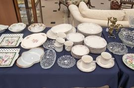 Many sets of dishes....