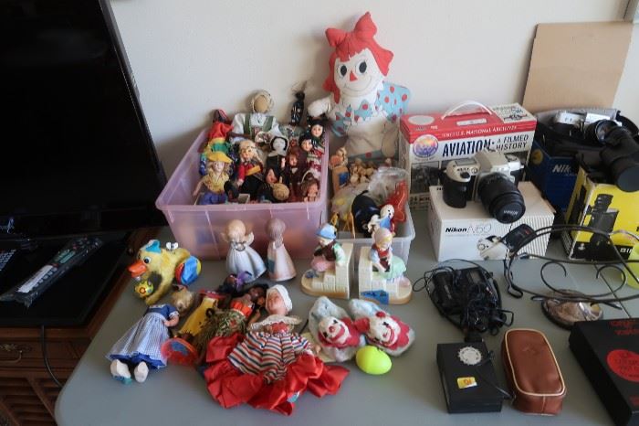 Misc. dolls, vintage toys, and vintage cameras.