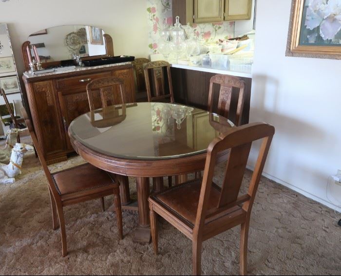 Art Deco / French Country dining room set.  6 chairs, custom glass top made for dining room table.  Solid marble top on the sideboard.  Made from Burl Walnut, from France. $1000