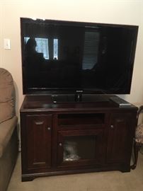 Samsung 58" Flatscreen Television & Remote 
Beautiful Mahogany Televsion Cabinet/Stand