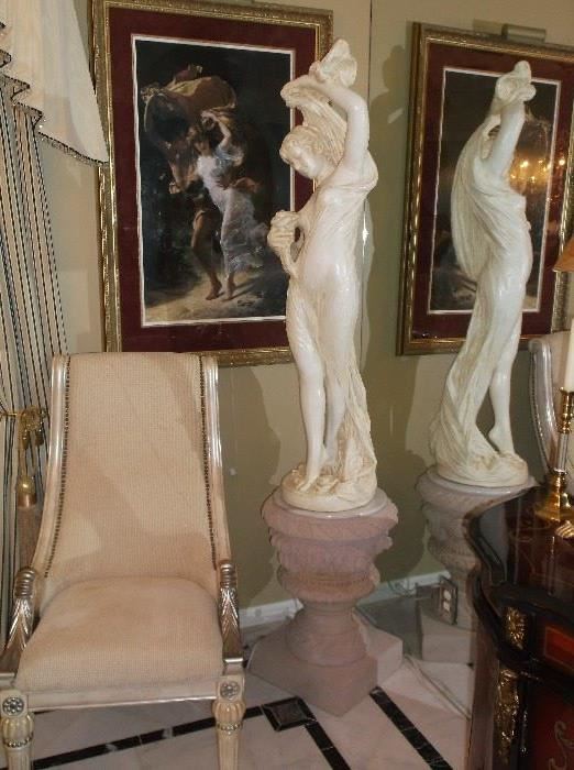 Large lady statue on marble top pedestal