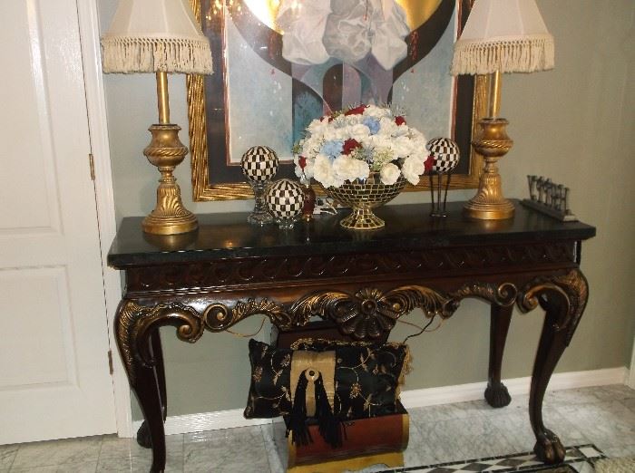Ornately carved console table w/black marble top