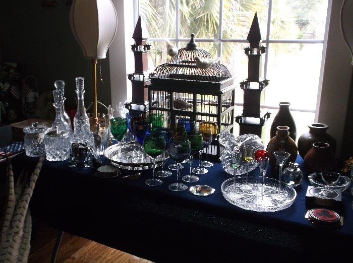 Large bird cage, decanters, goblets, trays, etc.