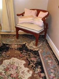 Needlepoint rug and red lacquer chair