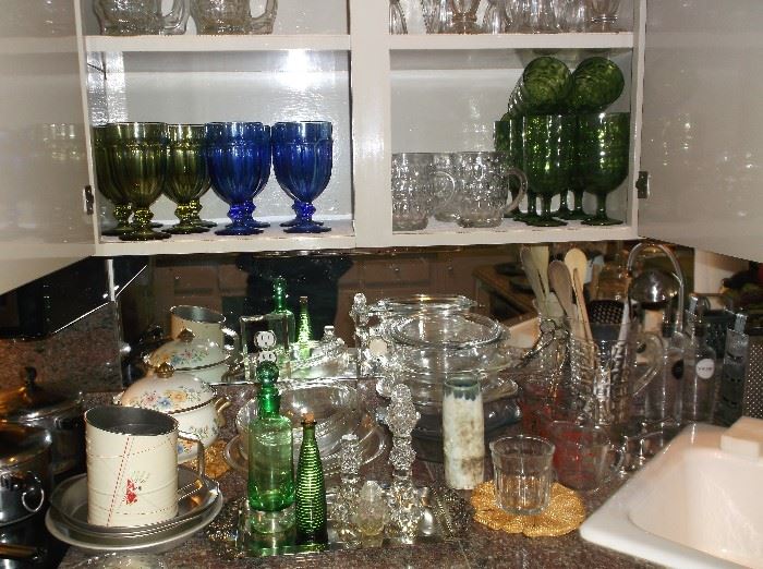 Kitchen items and colored glass goblets