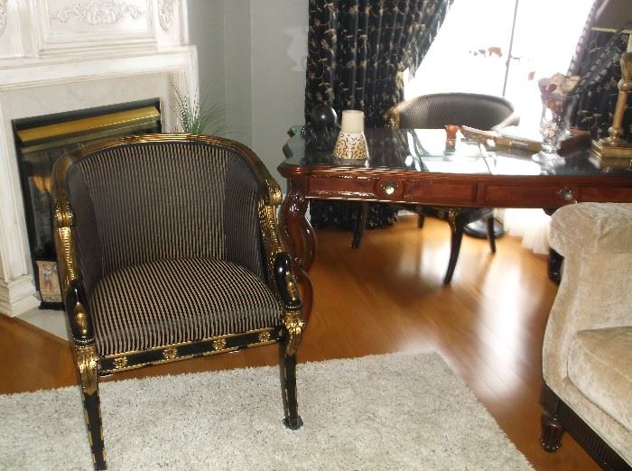 Mahogany cabriole leg desk and pair of swan neck black and gold chairs 