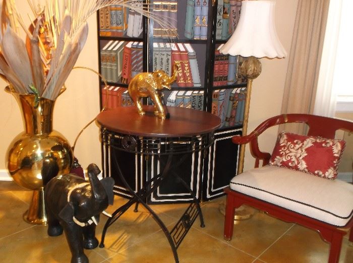 Three panel book painted screen, red lacquer chair, very large brass urn, brass elephant on metal table w/wood top, and leather elephant