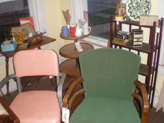 Pink vinyl chair, green fabric chair, stereoviewer, penny weight scale, baseball glove, softball, bat, fourth of July items, 3 tier table, parlor table, shelf.