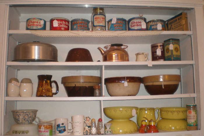 Hall yellow kitchenware, crock bowls, cake plate and cover, coffee cans, teapot.